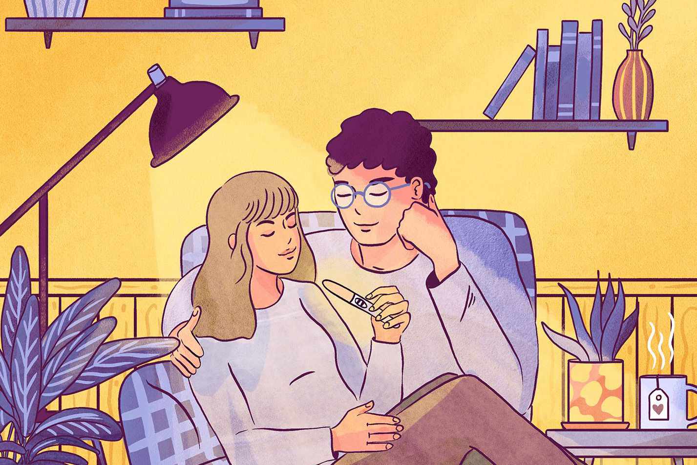 Couple regardant un test de grossesse